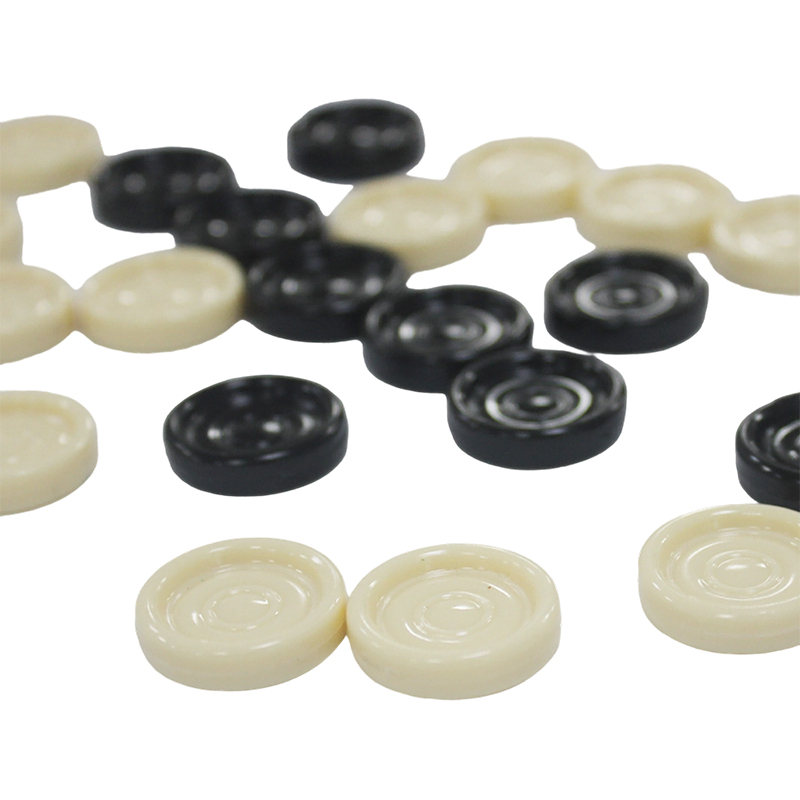 Dwukolorowe plastikowe warcaby